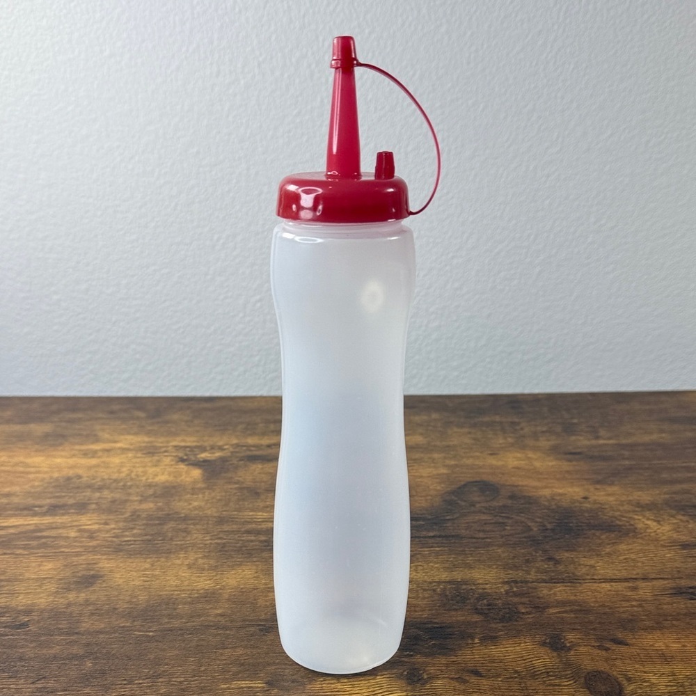 Red and Clear Squeeze Bottle